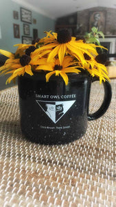 Smart Owl Coffee mug and flowers.