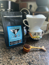 Load image into Gallery viewer, Smart Owl Coffee Essentials Blend French Vanilla Coffee, coffee dripper, and coffee grounds.